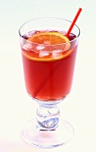 A cocktail with gin and cherry juice