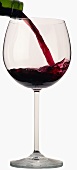 Red wine being poured into a red wine glass