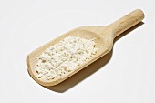 Flour on a wooden scoop