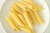 Several penne in a white dish