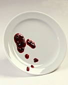 Blobs of jam on a plate