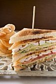 Club sandwich with chicken breast, crisps