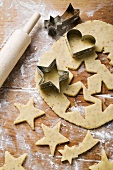 Cutting out heart-shaped and star-shaped biscuits