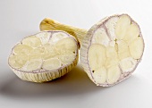 A garlic bulb, cut in half
