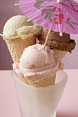 Strawberry, chocolate & vanilla ice cream in wafer cones, parasol