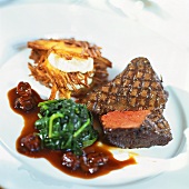 Grilled beef steak with spinach