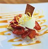 Strawberry dessert with vanilla ice cream & caramel sauce