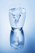 Swirling water in a glass