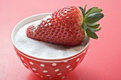 Strawberry in a sugar bowl