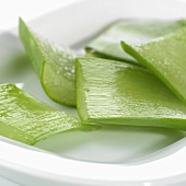 Aloe vera leaves, sliced open and cut into pieces