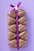 Several heart-shaped chocolates