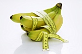 Bunch of bananas with a tape measure