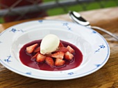 Strawberry soup with ice cream