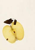 Half an apple with leaf