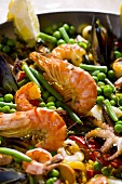 Paella with prawns, peas and octopus (detail)