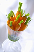 Caramelised carrots with herb sauce in a glass