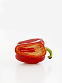 A red pepper with a slice removed