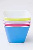 Coloured dishes, stacked