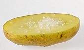 Half a potato with sea salt
