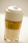 A glass of latte macchiato