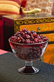 Dried cranberries in glass bowl