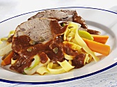 Pot roast beef with ribbon pasta and vegetables