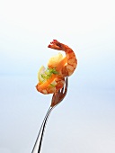 Two prawns on a fork