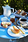 Breakfast in the garden with coffee and fruit