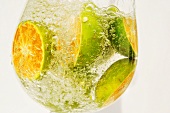 Citrus fruits in a glass of water