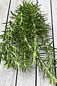 Fresh rosemary on a wooden table