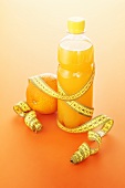 Orange juice and a tape measure