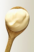 Bio-yoghurt on a wooden spoon