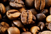 Close-up of coffee beans, filling the picture