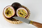 Passion fruits with kitchen knife