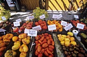 Various Heirloom Tomatoes at a Market