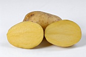 A whole potato and two potato halves