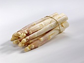 A bundle of white asparagus with violet tips