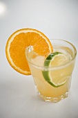 Aperitif with orange and lime