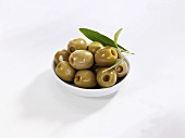 Green olives in a small bowl