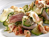 Pork fillet with tomatoes, courgettes and mozzarella