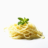 A heap of cooked spaghetti with oregano