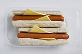 Two hot dogs in a plastic tray