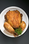 A roast chicken with parsley