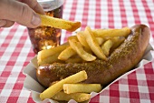 Currywurst (sausage with ketchup & curry powder) with chips & cola