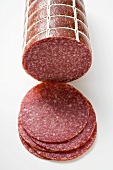 Salami, a piece and slices