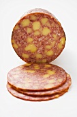 Käsewurst (cheese sausage), partly sliced