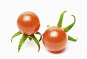 Two cocktail tomatoes