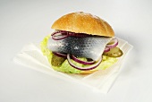 Herring roll with red onions