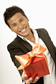 Asian man with gift