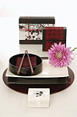 Arrangement of Asian tableware and gifts